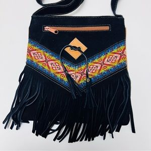 Black suede tribal crossbody bag with fringes. Purse with zippered pockets